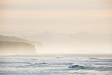 Scrappy peaks at St Clair Beach at dawn, Dunedin, New Zealand. 