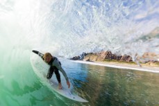 Zen Wallis gets barreled in a clean cyclone swell at Aramoana, Dunedin, New Zealand. 