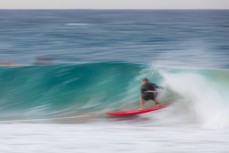 A local rides a foamie at Snapper Rocks a break near Coolangatta on the Gold Coast, Queensland, Australia.