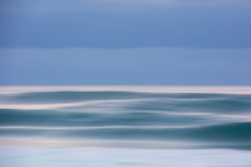 Clean waves on a cold winter ground swell at St Kilda, Dunedin, New Zealand.