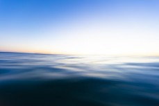 Dusk light on the ocean at Blackhead, Dunedin, New Zealand.