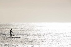 Local surfer Chris Sinclair enjoys dawn at St Clair, Dunedin, New Zealand. RIP 1.4.1971 - 6.9.2021