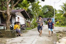 Villagers in Malakopi near Roxies in the Mentawais Island chain, Western Sumatra, Indonesia.