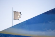 That flag's weathered a few storms at St Clair Beach,  St Clair, Dunedin, New Zealand.
Photo: Derek Morrison