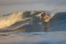 Keo Morrison on a dawn wave at Uluwatu, Bali, Indonesia.