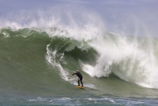 Brad Roberts at a remote reef break in the Catlins, New Zealand. Photo: Derek Morrison